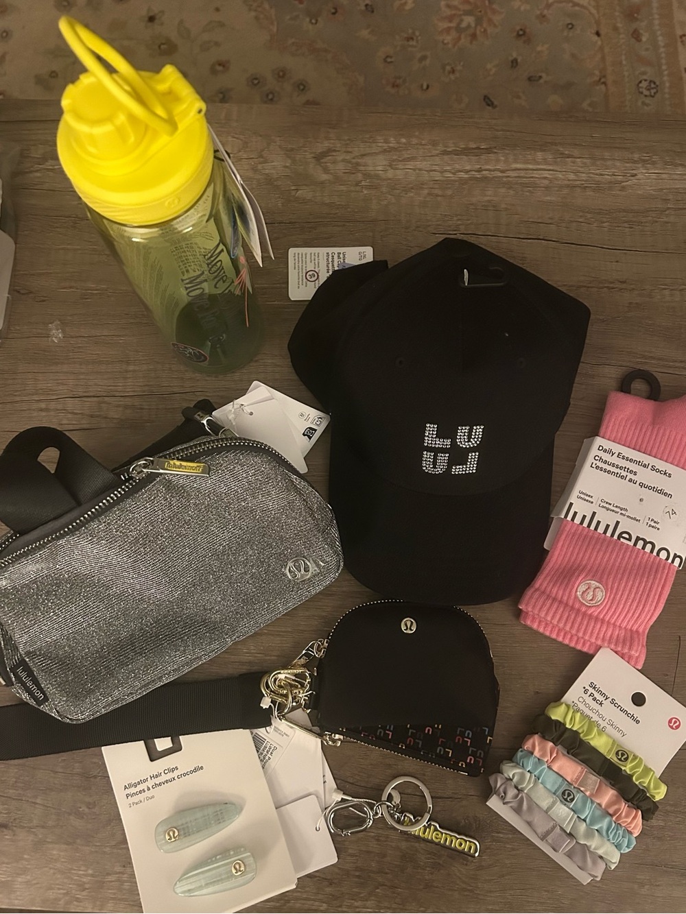 Lululemon Bundle - belt bag, hair accessories , water bottle, socks, hat & charm